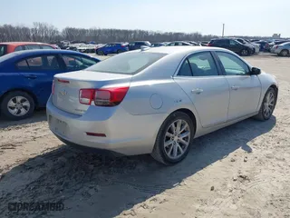 2015 Chevrolet Malibu LT with VIN 1G11D5SL1FF220792, listed as a IAAI auction lot 41776916 with 205,623 mi miles. Bid and sale history available at carsss.com. Image 4.