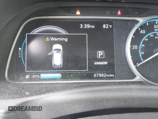 2019 Nissan LEAF SV z VIN 1N4AZ1CP7KC303423, wystawiony jako IAAI lot #42217532 z przebiegiem 67 992 mil mil oraz . Historia ofert i sprzedaży dostępna na DreamBid. Obrazek 18.