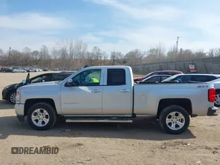 2016 Chevrolet Silverado 1500 LT with VIN 1GCVKREC4GZ125676, listed as a IAAI auction lot 42006237 with 114,699 mi miles. Bid and sale history available at carsss.com. Image 14.