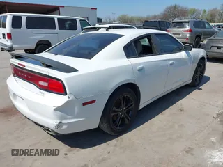 2011 Dodge Charger RT Plus with VIN 2B3CM5CT9BH591577, listed as a IAAI auction lot 41804275 with 126,750 mi miles. Bid and sale history available at carsss.com. Image 4.