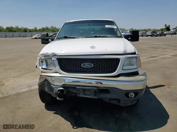 2001 Ford F-150 SuperCrew XLT with VIN 1FTRW08W41KE14810, listed as a Copart auction lot 65488844 with 185,372 mi miles and Salvage Title. Bid and sale history available at carsss.com. Image 10.