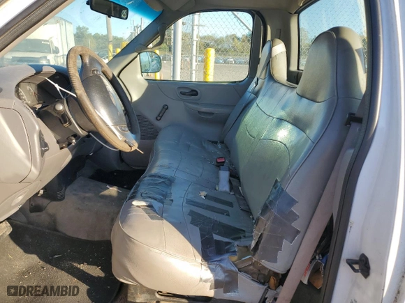1999 Ford F-150 Work Series with VIN 1FTRF17W5XKA84370, listed as a Copart auction lot 74773754 with 0 mi miles and Salvage Title. Bid and sale history available at carsss.com. Image 7.