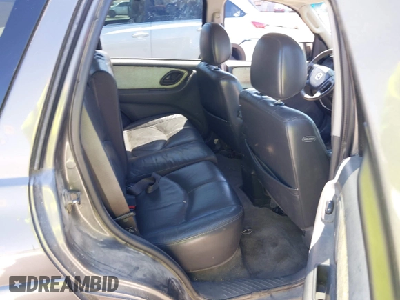 2003 Mazda Tribute ES with VIN 4F2CZ96113KM52877, listed as a IAAI auction lot 42217251 with 218,475 mi miles and . Bid and sale history available at DreamBid. Image 8.