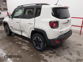 2015 Jeep Renegade Trailhawk with VIN ZACCJBCT2FPC33277, listed as a IAAI auction lot 41571863 with 98,912 mi miles and . Bid and sale history available at DreamBid. Image 3.
