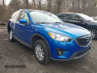 2013 Mazda CX-5 Touring with VIN JM3KE4CE0D0160711, listed as a IAAI auction lot 41843658 with 65,391 mi miles. Bid and sale history available at carsss.com. Image 1.