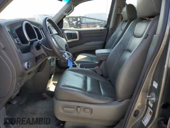 2007 Honda Ridgeline RTL w/Leather with VIN 2HJYK16587H531177, listed as a Copart auction lot 70881344 with 196,938 mi miles and Salvage Title. Bid and sale history available at carsss.com. Image 7.