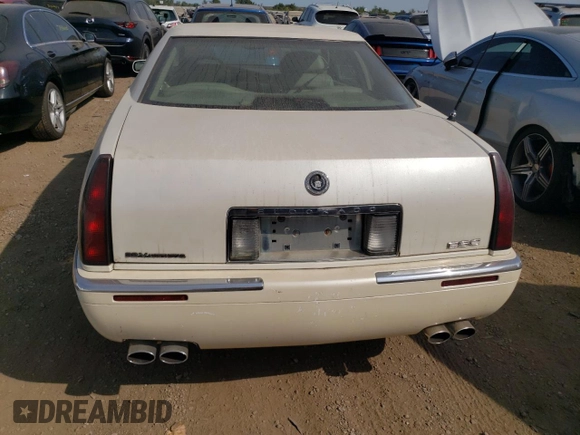 2000 Cadillac Eldorado z VIN 1G6EL12Y2YU179560, wystawiony jako Copart lot #70635784 z przebiegiem 92 959 mil mil oraz Czysty tytuł • Clean title. Historia ofert i sprzedaży dostępna na DreamBid. Obrazek 6.