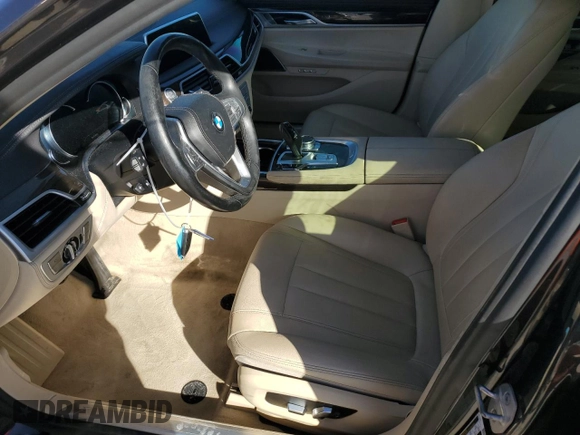 2018 BMW 7 Series 740i with VIN WBA7E2C55JG742497, listed as a Copart auction lot 82173994 with 52,354 mi miles and Salvage Title. Bid and sale history available at carsss.com. Image 7.
