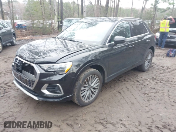 2021 Audi Q3 Premium with VIN WA1AUCF34M1148531, listed as a IAAI auction lot 41815286 with 31,934 mi miles and . Bid and sale history available at DreamBid. Image 2.