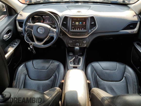 2014 Jeep Cherokee Limited with VIN 1C4PJMDS7EW291342, listed as a Copart auction lot 61446225 with 123,792 mi miles and Salvage title. Bid and sale history available at DreamBid. Image 8.
