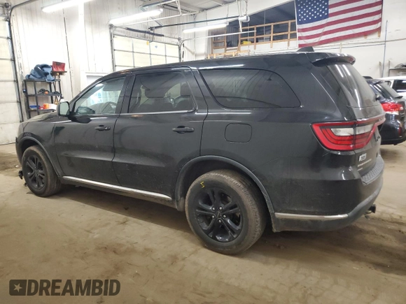 2015 Dodge Durango Special Service with VIN 1C4RDJFG2FC193572, listed as a Copart auction lot 48817575 with 210,420 mi miles and Salvage title. Bid and sale history available at DreamBid. Image 2.