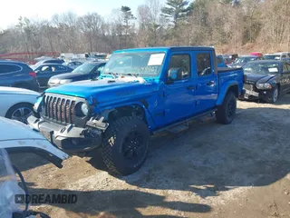 2021 Jeep Gladiator Willys with VIN 1C6HJTAG3ML572690, listed as a IAAI auction lot 41649907 with 74,734 mi miles and . Bid and sale history available at DreamBid. Image 2.