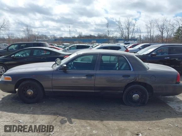 2007 Ford Police Interceptor z VIN 2FAFP71W97X155407, wystawiony jako IAAI lot #41881583 z przebiegiem Nie podano mil oraz . Historia ofert i sprzedaży dostępna na DreamBid. Obrazek 14.