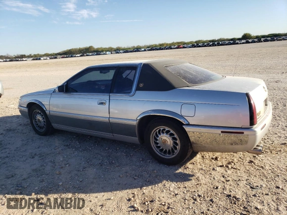 2000 Cadillac Eldorado Touring with VIN 1G6ET1295YU145248, listed as a Copart auction lot 82160574 with 87,294 mi miles and Salvage Title. Bid and sale history available at DreamBid. Image 2.
