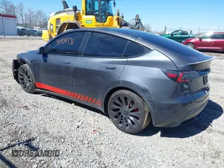 2021 Tesla Model Y Performance with VIN 5YJYGDEF1MF268405, listed as a IAAI auction lot 41818331 with 43,621 mi miles and . Bid and sale history available at DreamBid. Image 3.