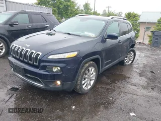 2014 Jeep Cherokee Limited with VIN 1C4PJMDS0EW277301, listed as a IAAI auction lot 42357034 with 61,825 mi miles and . Bid and sale history available at DreamBid. Image 2.