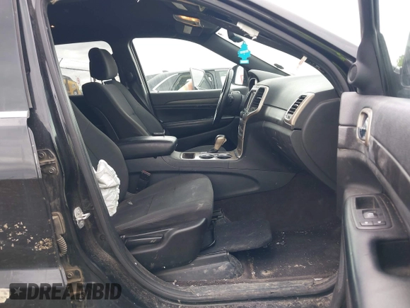 2016 Jeep Grand Cherokee Laredo with VIN 1C4RJFAG2GC436005, listed as a IAAI auction lot 42377859 with 129,724 mi miles and . Bid and sale history available at DreamBid. Image 5.