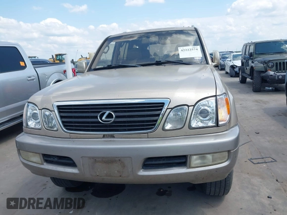2001 Lexus LX 470 with VIN JTJHT00W713511796, listed as a IAAI auction lot 42222574 with 297,427 mi miles and . Bid and sale history available at carsss.com. Image 12.