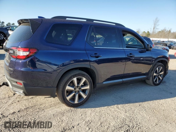 2023 Honda Pilot Touring with VIN 5FNYG2H73PB007631, listed as a Copart auction lot 82382153 with 6,050 mi miles. Bid and sale history available at carsss.com. Image 3.
