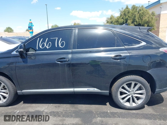2015 Lexus RX 450h with VIN 2T2ZB1BA0FC001351, listed as a IAAI auction lot 41916676 with Not Provided miles and . Bid and sale history available at DreamBid. Image 14.