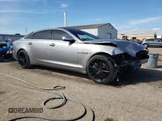 2011 Jaguar XJ with VIN SAJXA2GE5BMV13122, listed as a Copart auction lot 73113044 with 164,196 mi miles and Salvage Title. Bid and sale history available at DreamBid. Image 4.