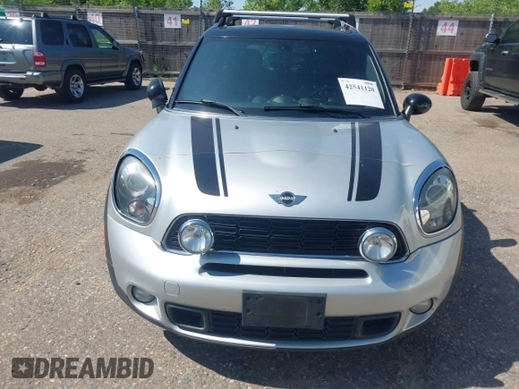 2014 MINI Countryman S with VIN WMWZC5C52EWP36667, listed as a IAAI auction lot 42541120 with 149,331 mi miles and . Bid and sale history available at DreamBid. Image 6.