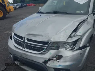 2011 Dodge Journey Crew z VIN 3D4PG3FG3BT541570, wystawiony jako IAAI lot #42773320 z przebiegiem 235 050 mil mil oraz . Historia ofert i sprzedaży dostępna na DreamBid. Obrazek 6.