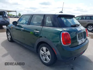 2016 MINI Hardtop 4 Door with VIN WMWXU1C52G2D10035, listed as a IAAI auction lot 42190544 with 106,383 mi miles and . Bid and sale history available at DreamBid. Image 3.