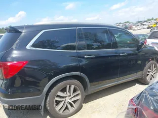 2017 Honda Pilot Touring с VIN 5FNYF5H9XHB024868, выставлен на аукционе IAAI как лот 42300608 с пробегом 133 018 миль миль и . История ставок и продаж доступна на DreamBid. Изображение 14.