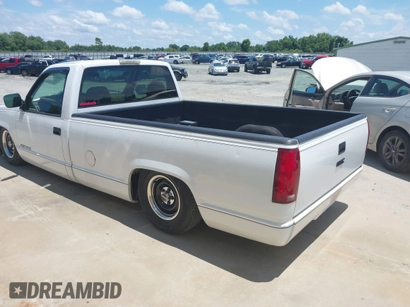 1994 GMC Sierra 1500 z VIN 1GTFC24KXRE522028, wystawiony jako IAAI lot #42463380 z przebiegiem 153 411 mil mil oraz . Historia ofert i sprzedaży dostępna na DreamBid. Obrazek 3.