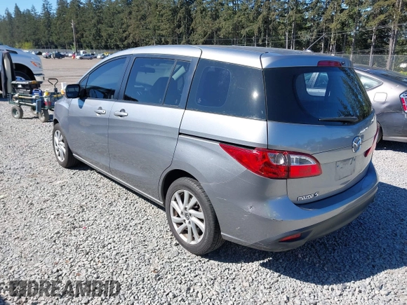 2014 Mazda 5 Sport z VIN JM1CW2BL0E0172678, wystawiony jako IAAI lot #42192057 z przebiegiem 89 848 mil mil oraz . Historia ofert i sprzedaży dostępna na DreamBid. Obrazek 3.