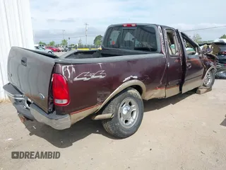 2000 Ford F-150 XL with VIN 1FTRX18L2YNB87229, listed as a IAAI auction lot 42041368 with 84,956 mi miles. Bid and sale history available at carsss.com. Image 4.