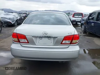 2002 Infiniti I35 Luxury z VIN JNKDA31A92T014339, wystawiony jako IAAI lot #41454424 z przebiegiem 119 025 mil mil oraz . Historia ofert i sprzedaży dostępna na DreamBid. Obrazek 16.