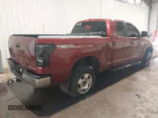 2010 Toyota Tundra z VIN 5TFUW5F1XAX144077, wystawiony jako IAAI lot #40135939 z przebiegiem 152 828 mil mil oraz . Historia ofert i sprzedaży dostępna na DreamBid. Obrazek 4.