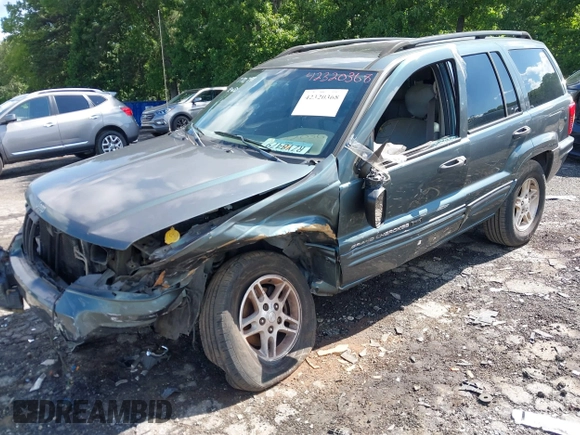 2004 Jeep Grand Cherokee Laredo with VIN 1J4GX48S34C192181, listed as a IAAI auction lot 42320368 with 181,415 mi miles and . Bid and sale history available at DreamBid. Image 6.