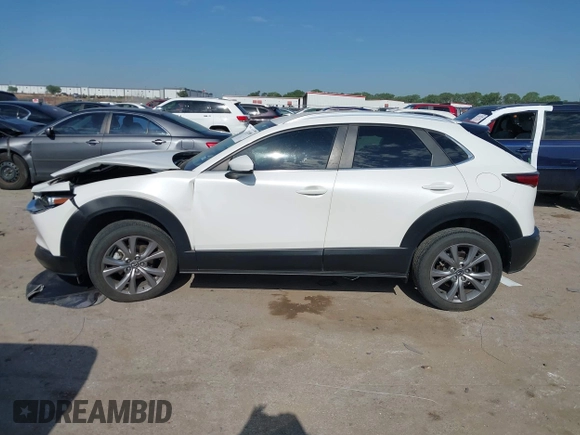 2023 Mazda CX-30 S Carbon Edition with VIN 3MVDMBCM2PM552282, listed as a IAAI auction lot 42241909 with 14,765 mi miles and . Bid and sale history available at DreamBid. Image 14.