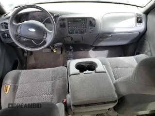 2001 Ford F-150 XL z VIN 1FTRX18L41NB56019, wystawiony jako Copart lot #62537655 z przebiegiem Nie podano mil oraz Szkoda całkowita • Salvage title. Historia ofert i sprzedaży dostępna na DreamBid. Obrazek 8.