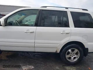 2007 Honda Pilot EX-L with VIN 5FNYF28527B015589, listed as a IAAI auction lot 41113153 with 352,772 mi miles. Bid and sale history available at carsss.com. Image 14.