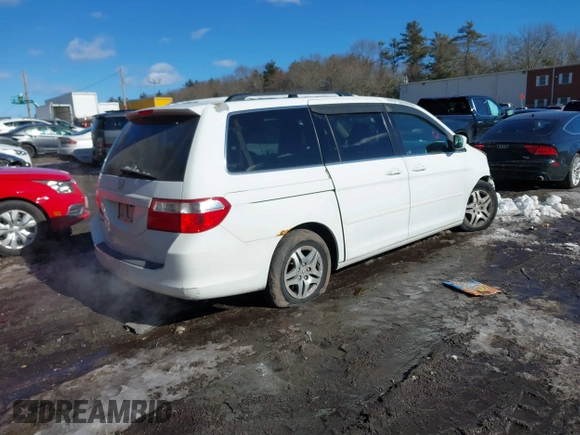 2007 Honda Odyssey EX-L with VIN 5FNRL38637B127782, listed as a IAAI auction lot 41590102 with 194,590 mi miles and . Bid and sale history available at DreamBid. Image 4.