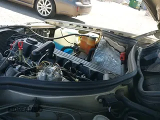 1986 Mercedes-Benz 300 E z VIN WDBEA30DXGA214357, wystawiony jako IAAI lot #42517226 z przebiegiem 169 670 mil mil oraz . Historia ofert i sprzedaży dostępna na DreamBid. Obrazek 12.