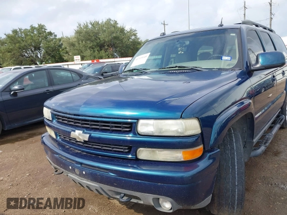 2005 Chevrolet Suburban Z71 with VIN 3GNFK16Z05G242037, listed as a IAAI auction lot 40719140 with 164,409 mi miles. Bid and sale history available at carsss.com. Image 6.