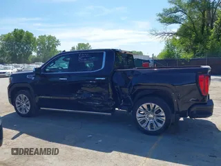 2021 GMC Sierra 1500 Denali with VIN 1GTU9FEL4MZ253708, listed as a IAAI auction lot 42209839 with 52,279 mi miles and . Bid and sale history available at DreamBid. Image 14.