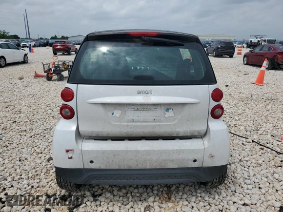 2013 Smart fortwo Pure with VIN WMEEJ3BA1DK633239, listed as a Copart auction lot 54829205 with 147,647 mi miles and Salvage Title. Bid and sale history available at carsss.com. Image 6.