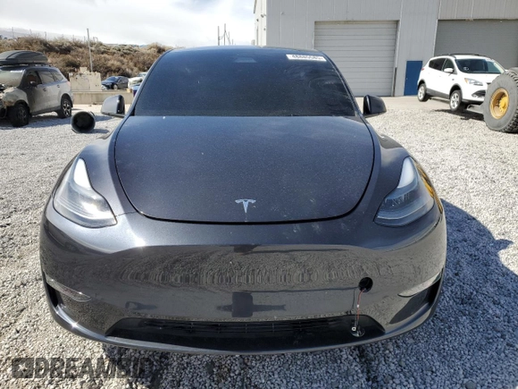 2024 Tesla Model Y Performance z VIN 7SAYGDEF6RF166365, wystawiony jako Copart lot #48885585 z przebiegiem Nie podano mil oraz Szkoda całkowita • Salvage title. Historia ofert i sprzedaży dostępna na DreamBid. Obrazek 5.