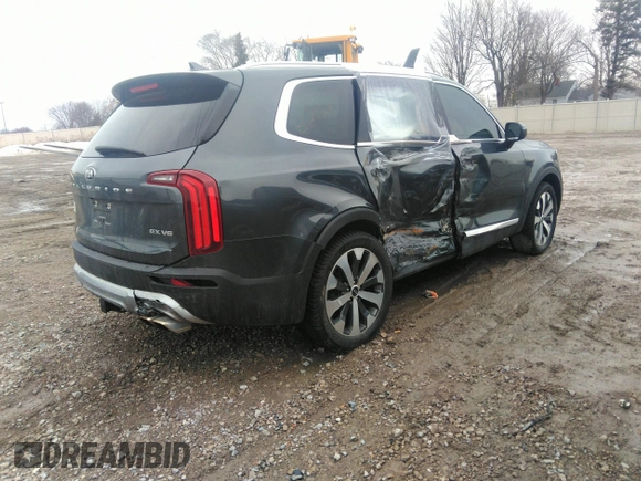 2021 Kia Telluride EX with VIN 5XYP3DHC4MG116989, listed as a IAAI auction lot 41282102 with 58,460 mi miles and . Bid and sale history available at DreamBid. Image 4.