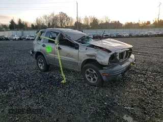 2003 Chevrolet Tracker ZR2 z VIN 2CNBJ734736913357, wystawiony jako Copart lot #86546884 z przebiegiem Nie podano mil oraz Nie do naprawy • Non repairable. Historia ofert i sprzedaży dostępna na DreamBid. Obrazek 11.