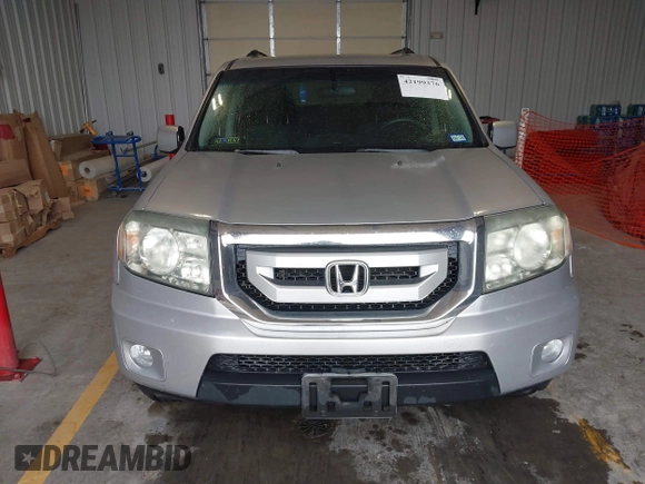 2011 Honda Pilot EX with VIN 5FNYF3H44BB022324, listed as a IAAI auction lot 42199376 with 277,735 mi miles and . Bid and sale history available at carsss.com. Image 12.