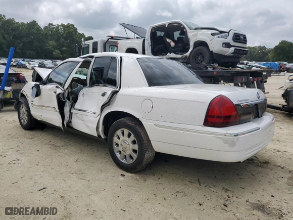 2006 Mercury Grand Marquis LS Premium with VIN 2MEHM75W26X619883, listed as a Copart auction lot 71742044 with 101,426 mi miles and Salvage Title. Bid and sale history available at carsss.com. Image 2.