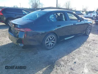 2024 BMW i5 eDrive40 with VIN WBY33FK00RCP37858, listed as a IAAI auction lot 41016747 with Not provided miles and . Bid and sale history available at DreamBid. Image 4.