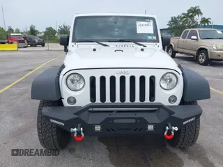 2018 Jeep Wrangler Unlimited Sport S with VIN 1C4BJWDG7JL895132, listed as a IAAI auction lot 42435993 with 71,394 mi miles and . Bid and sale history available at DreamBid. Image 6.